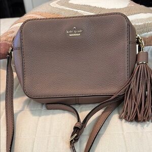 Kate Spade tea rose pink Leather Crossbody with Tassel. Color tea rose I think
